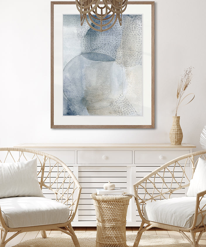 Global artisinal art adorns the walls of this coastal lounge area.